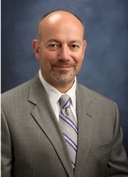 John M. Riccione